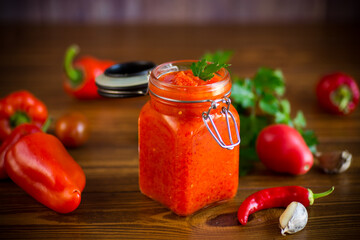 fresh natural homemade sauce made of peppers, tomatoes and other vegetables