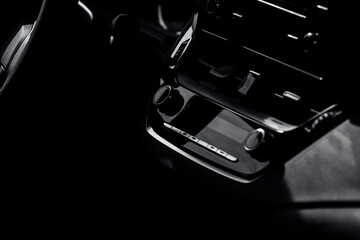 Fototapeta na wymiar control panel and cd in a new modern car interior