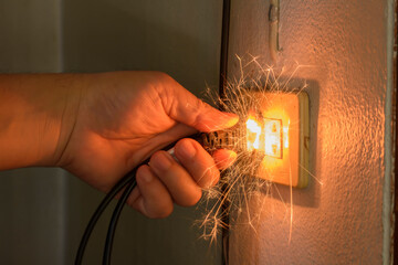 Short-circuiting resulting in sparks caused by substandard electrical appliances causing damage and...