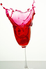 Splash of Red Water from the Dropped Ice