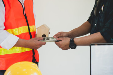 The contractor receives the wages after completing the construction project.