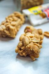 Coconut and peanut coated chocolate