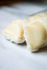 Coconut covered and filled chocolate bar