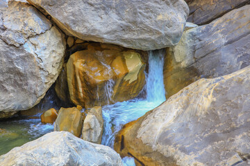 waterfall flowing in nature, cascade, cascade between rocks. Hakkari in Turkey
