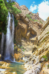 waterfall flowing in nature, cascade, cascade between rocks. Hakkari in Turkey
