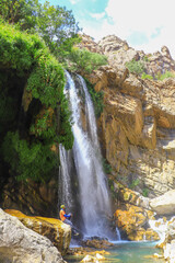 waterfall flowing in nature, cascade, cascade between rocks. Hakkari in Turkey
