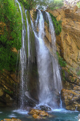 waterfall flowing in nature, cascade, cascade between rocks. Hakkari in Turkey
