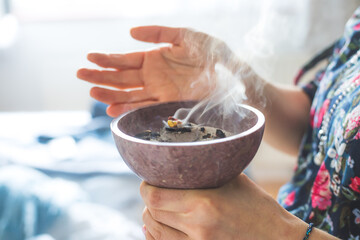 Traditional esoteric incense ritual at New Year and Christmas, smoke for cleaning the house
