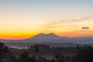 beautiful of sunrise with mountain in Thung Salaeng Luang National Park, Phetchabun Province, Thailand. soft focus and low key.
