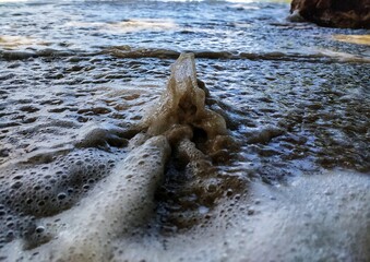 water flowing into the river
