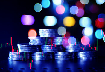Fototapeta premium graph and rows of coins for finance and business concept