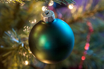 Close up picture of a green Christmas ornament