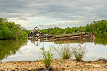 Broken old ship in the river Batang Salak, Kuching Sarawak