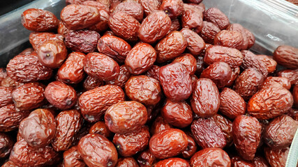 Dried red dates display on market