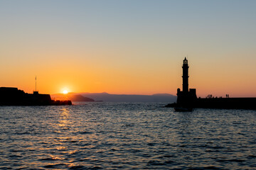 Fototapeta na wymiar a magnificent golden sunset in Chania of Crete