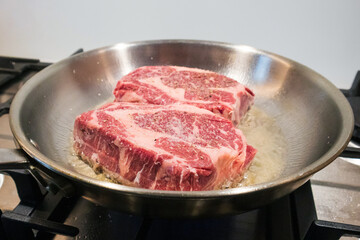 Ribeye beef steak in a pan. Ketogenic or carnivore diet.