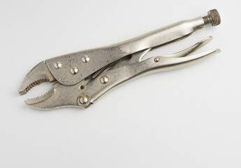 Manual metal tool, universal wrench on a white background.