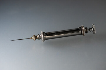 antique syringe ii