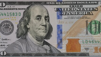 Ben Franklin winks at us from the 100 dollar bill. Funny character animation of the United States money. - Powered by Adobe