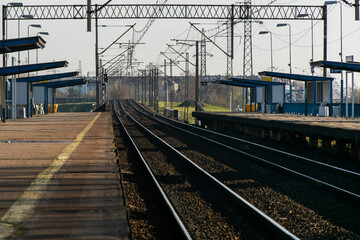 Fototapeta na wymiar An empty suburban railway station on the outskirts of Warsaw