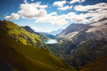 Naklejka premium Fedaia Lake in Italian Dolomites, summertime, travel, hikong