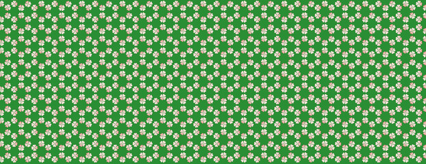 
symmetrically arranged four-leaf clovers with color gradient on a light green background