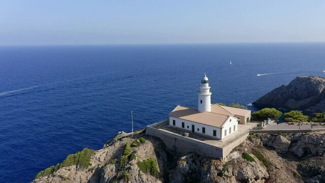 Aerial view, flight at  lighthouse Far de Capdepera with cliffs, Cala Ratjada, Mallorca, Balearic Islands, Spain