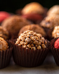 candy cane truffle close-up on a dark background, macro