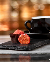 Truffle on the table with a cup of coffee