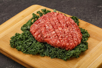 Raw beef burger cutlet for cooking