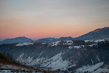 Obraz na płótnie Canvas Amazing mountain sunset in winter time