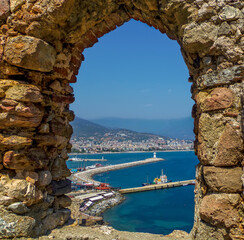 A framed view from the castle towards the city of Alanya Turkey in the summertime