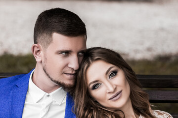Fototapeta premium Beautiful young couple. Wedding. A family