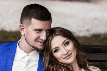 Fototapeta premium Beautiful young couple. Wedding. A family