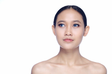 A beautiful young white girl model in pigtails with blue eyes or blue contact lens and natural makeup