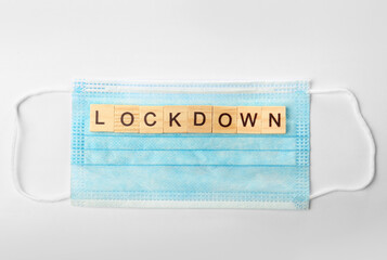Lockdown lettering on medical mask
