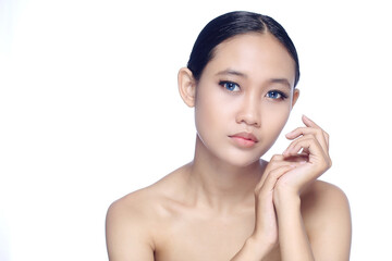 A beautiful young white girl model in pigtails with blue eyes or blue contact lens and natural makeup