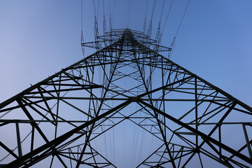 Large Electricity pylon (Strommasten) also overhead line pylon in Winter. Up View.