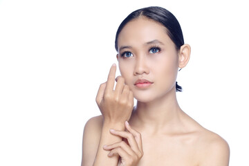 A beautiful young white girl model in pigtails with blue eyes or blue contact lens and natural makeup