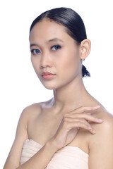 A beautiful young white girl model in pigtails with blue eyes or blue contact lens and natural makeup 