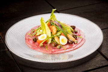 Salad with tuna, kenyan beans, potatoes, anchovies and tajar olives
