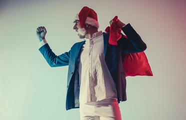 man with a santa claus hat for christmas. Christmas man. Fun photo. Funny.