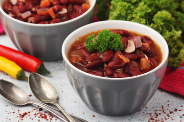 Two bowls with traditional Georgian dish - lobio