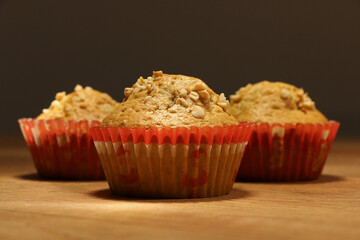 white muffins on a wooden table