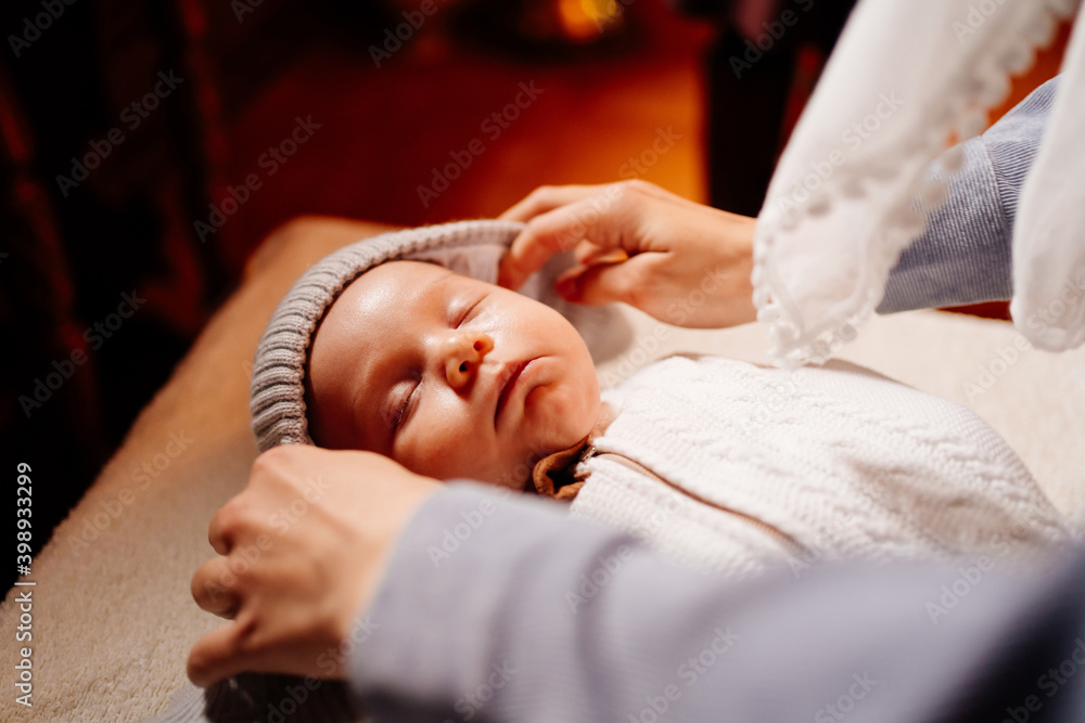 Canvas Prints the baby dress up in clothes on the table in the Church. ordinance of baptism.