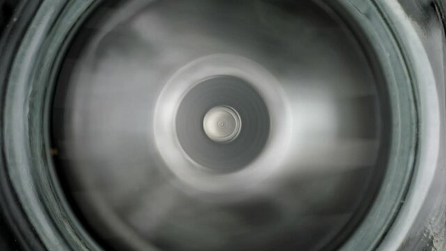 Blender rotating blades. Sharp blender rotating blades. Close-up shot. High angle view.