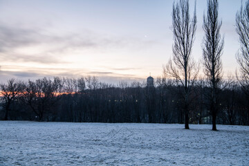 old buildings of the architectural and park complex at dawn on a winter morning