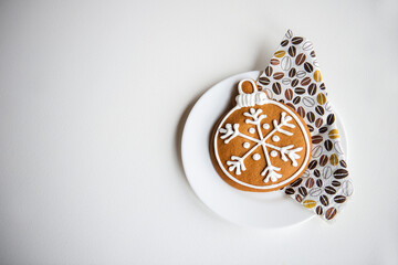 Christmas cookie gingerbread isolated on a white background,absolute wintertime minimalism