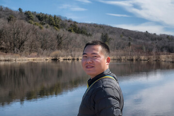 Fototapeta na wymiar chinese man outside in nature