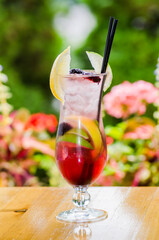 Strawberry Caipirinha with fresh mint and strawberry in glasses